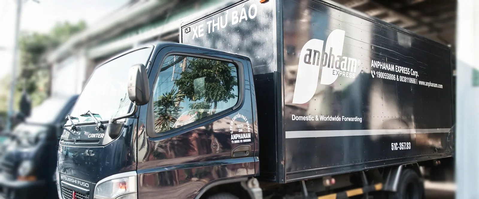 Xe tải thùng kín in logo An Pha Nam Express